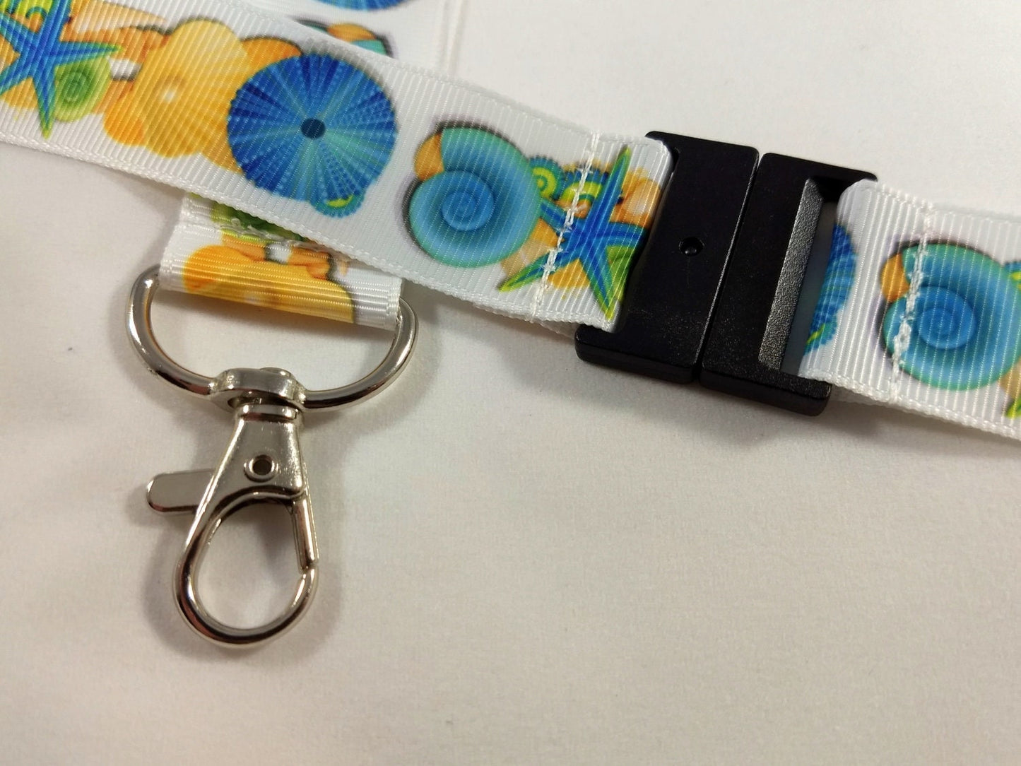 Cordón de cinta con forma de concha marina