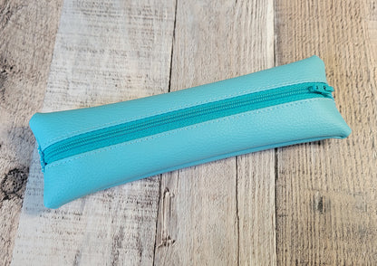 Estuche elástico de piel sintética texturizada