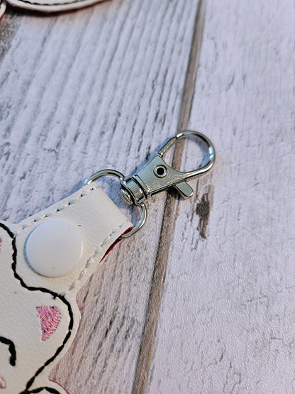 Llavero bordado del gato de la suerte