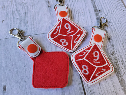 Llavero bordado con dados D20