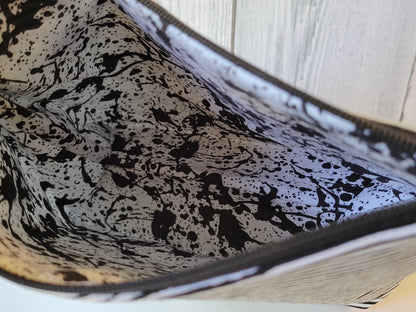 Estuche con cremallera de calaveras