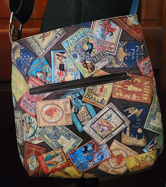 Bag with vintage-style book cover pattern on a dark background