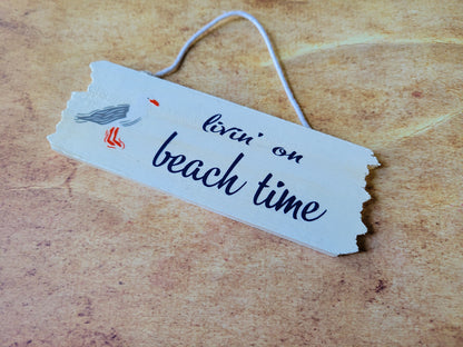 Letreros de madera con temática de playa